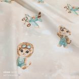 Bézs alapon pilóta kisállatok mintás pamutvászon